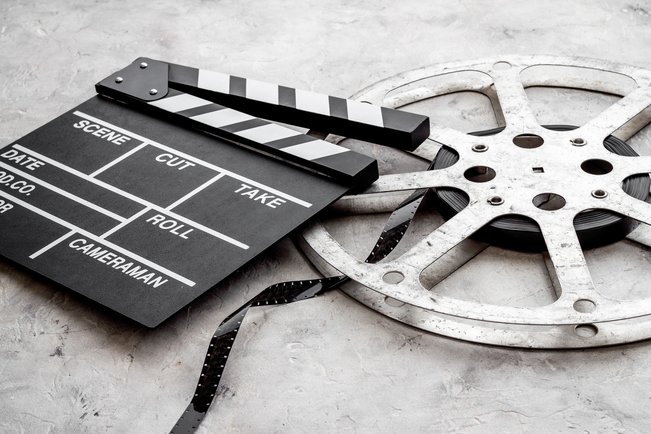 Motion picture film reel with movie clapper. Cinema concept